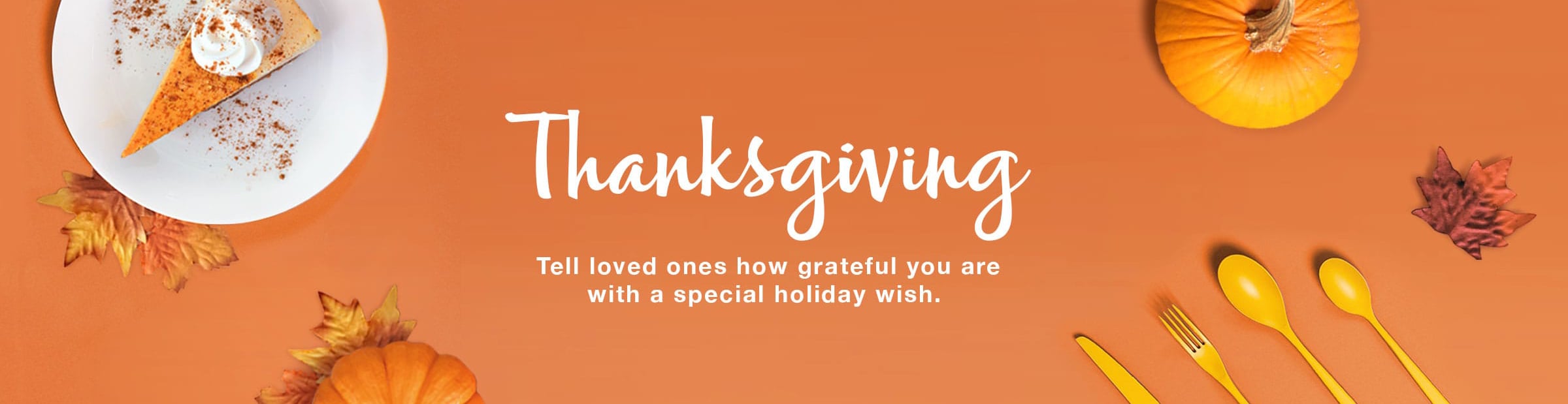 Thanksgiving setting with leaves, pumpkins, pumpkin pies, and silverware. Tell loved ones how grateful you are with a special holiday wish.