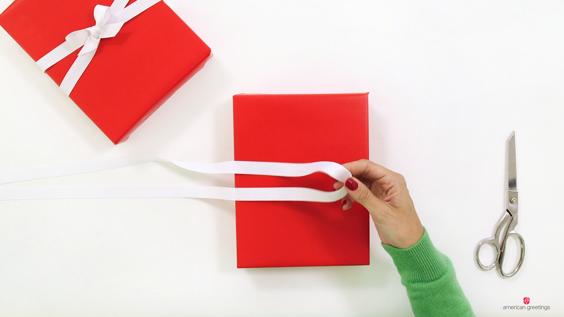 Try this revolutionary way to make a special wrapping paper ribbon ornament  : Bowdabra